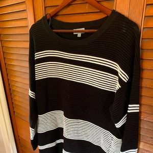 Black and white woman’s sweater